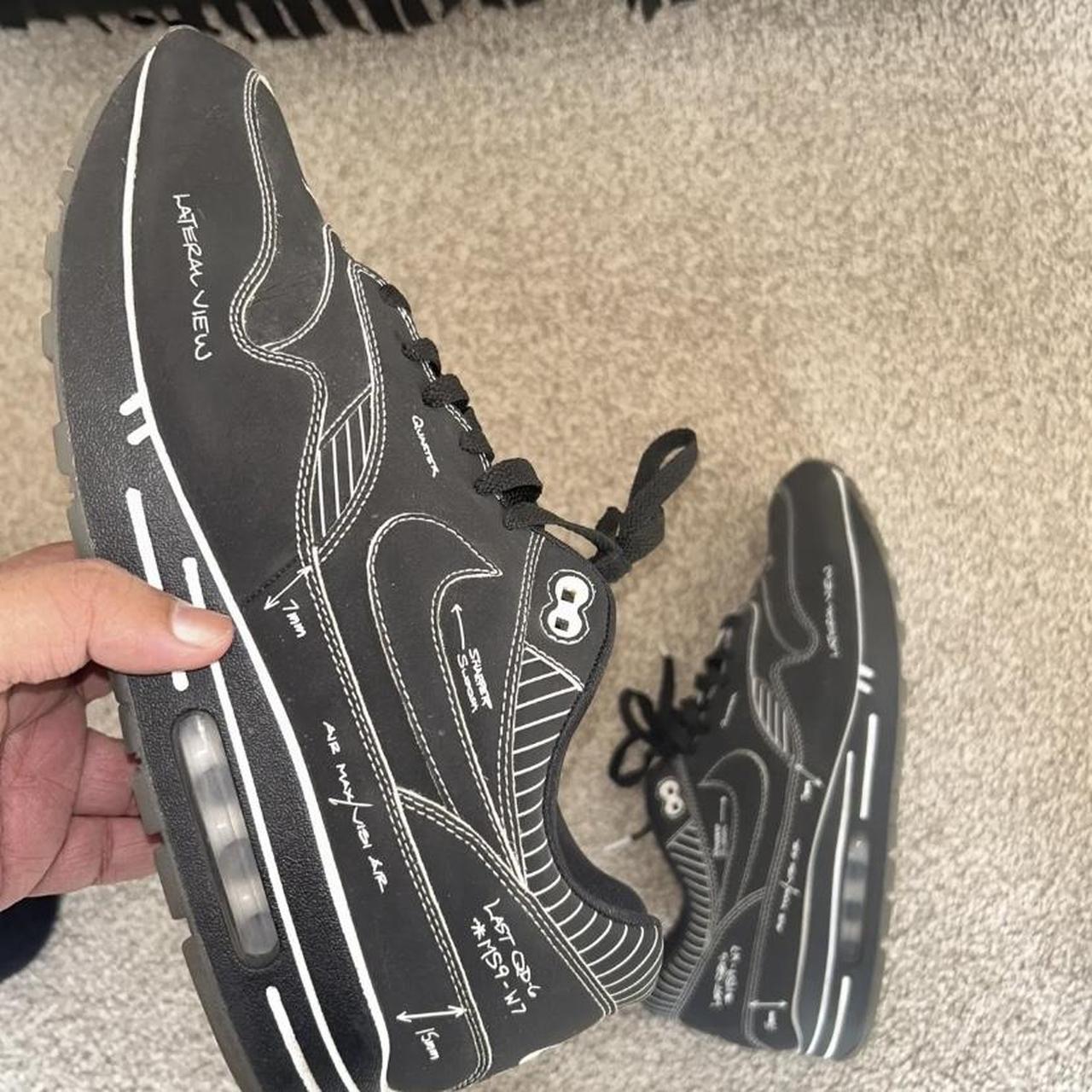 nike sketch to shelf black