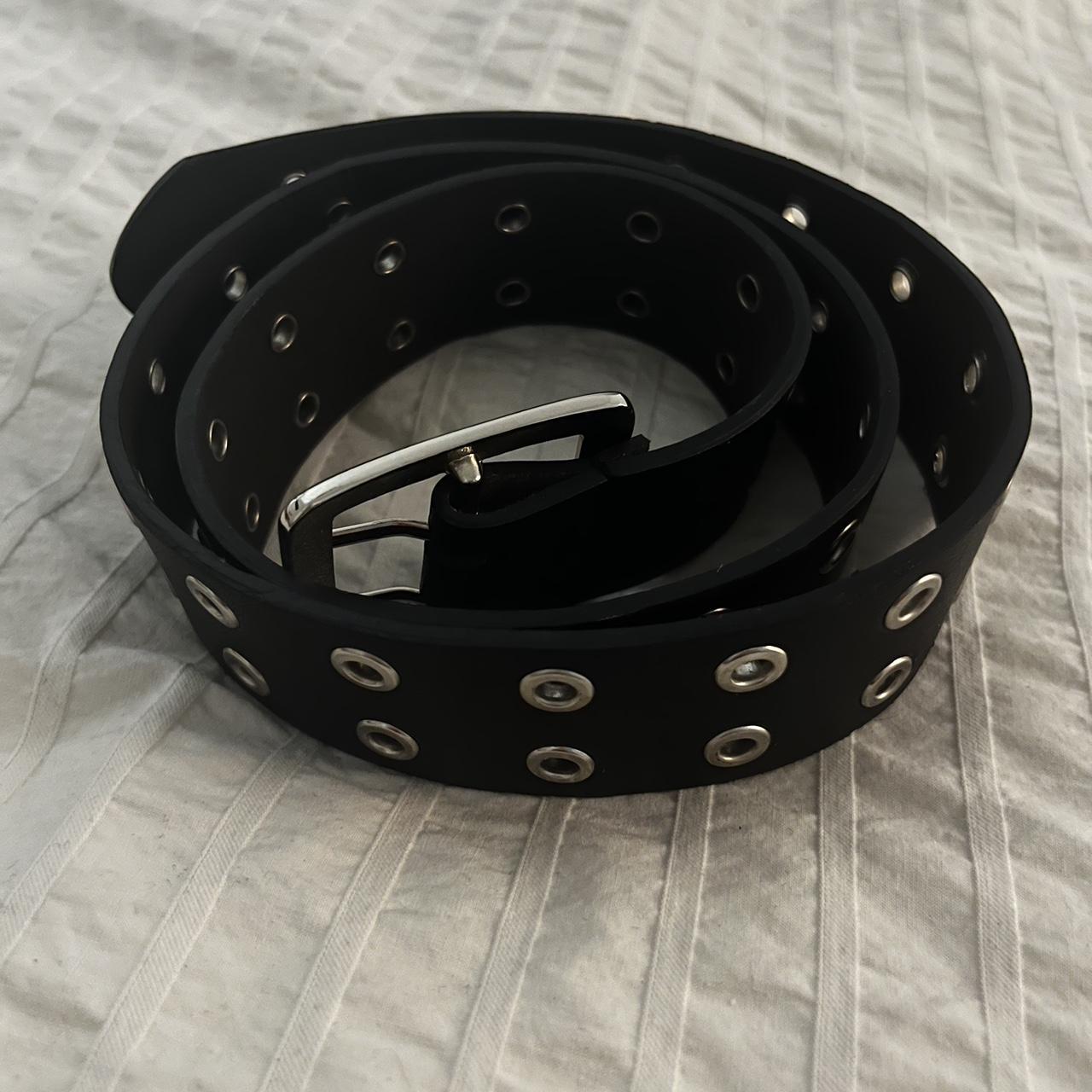 Black belt with metal eyelets. Never worn; like new... Depop
