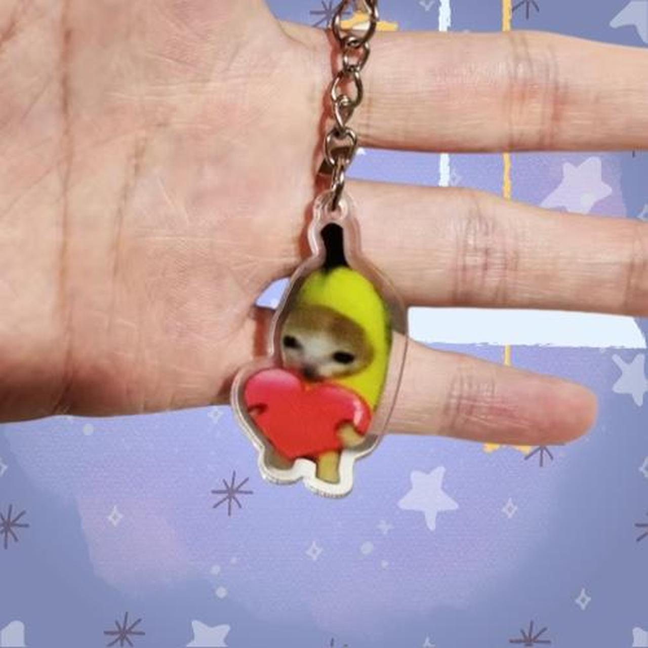 (Sad Cat Meme) Banana Cat Holding Heart Keychain... - Depop