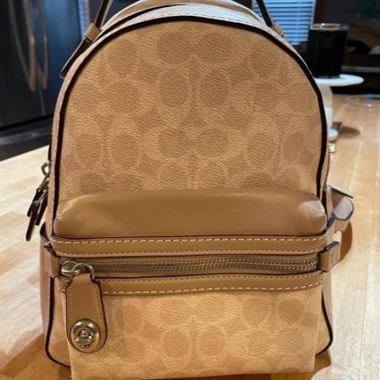 Coach selling C7283 Court Backpack In Blocked Signature Canvas In Brown Strawberry Haze