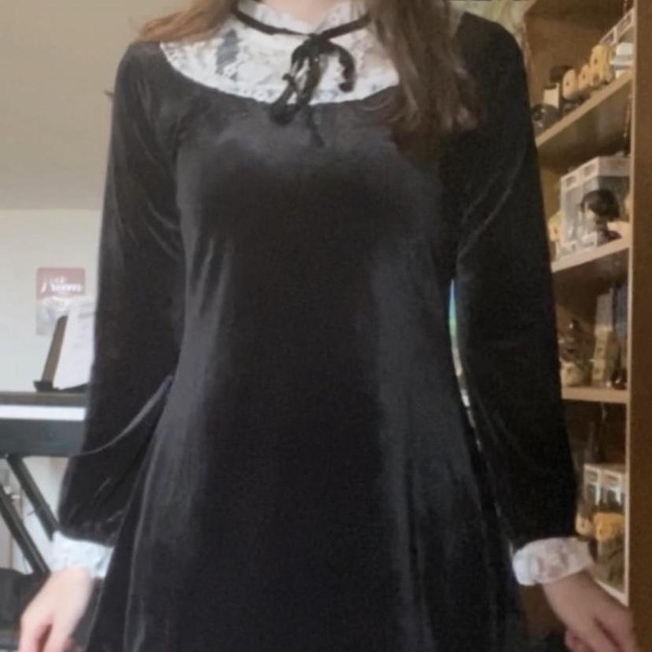 Black velvet dress with lace collar and cuffs