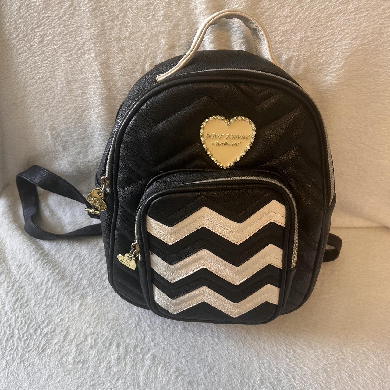 Betsey Johnson black and white mini backpack.