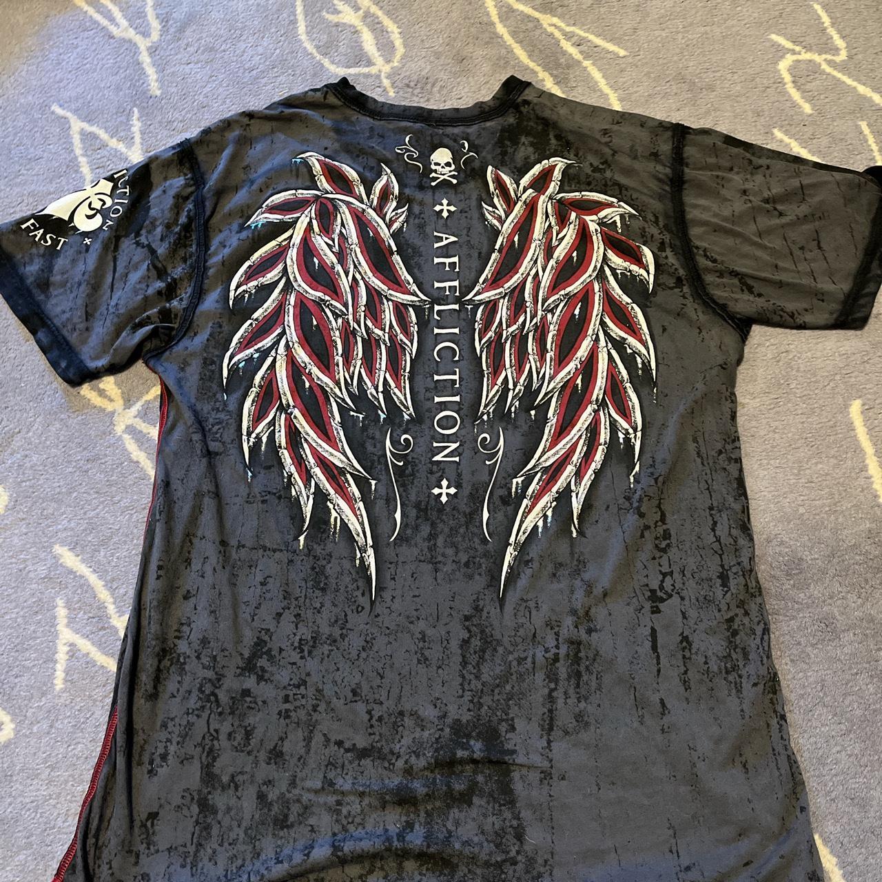 Affliction wings and cross tee distressed... - Depop