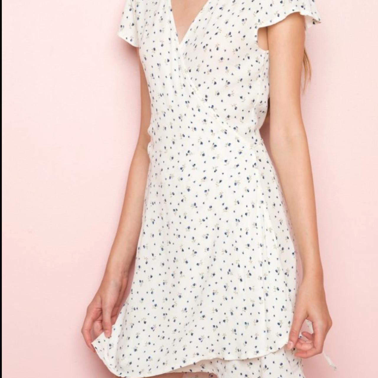 Brandy Melville Robbie wrap dress with blue floral... Depop