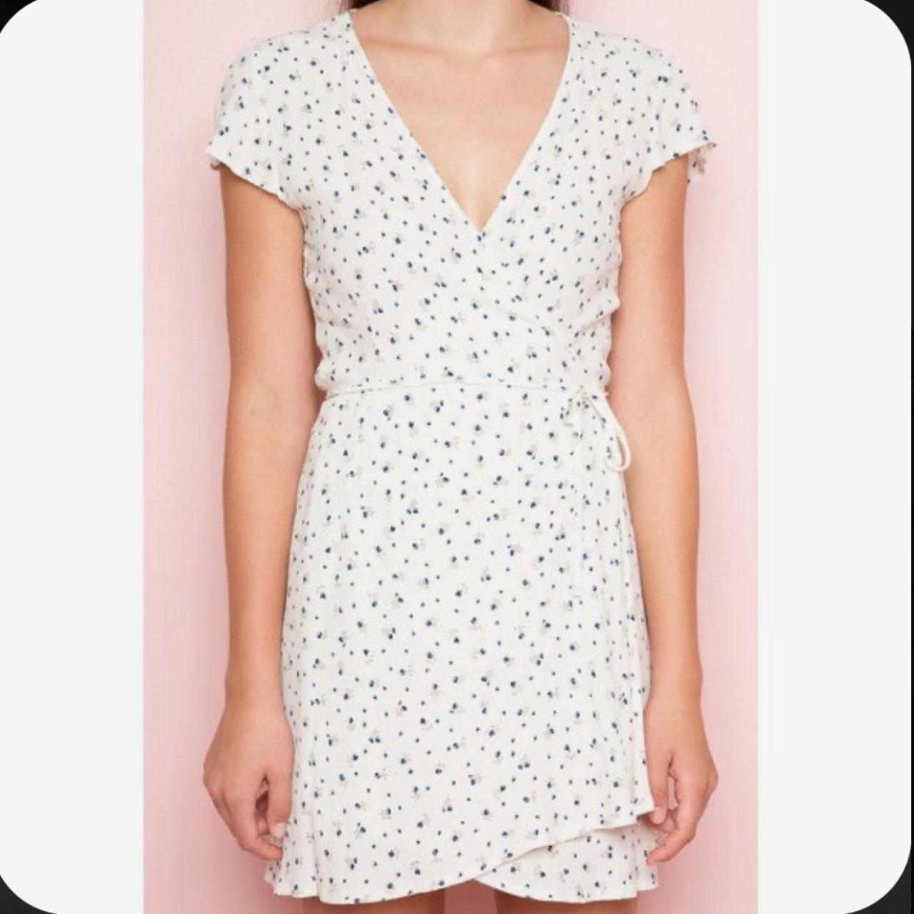 Brandy Melville Robbie wrap dress with blue floral... Depop