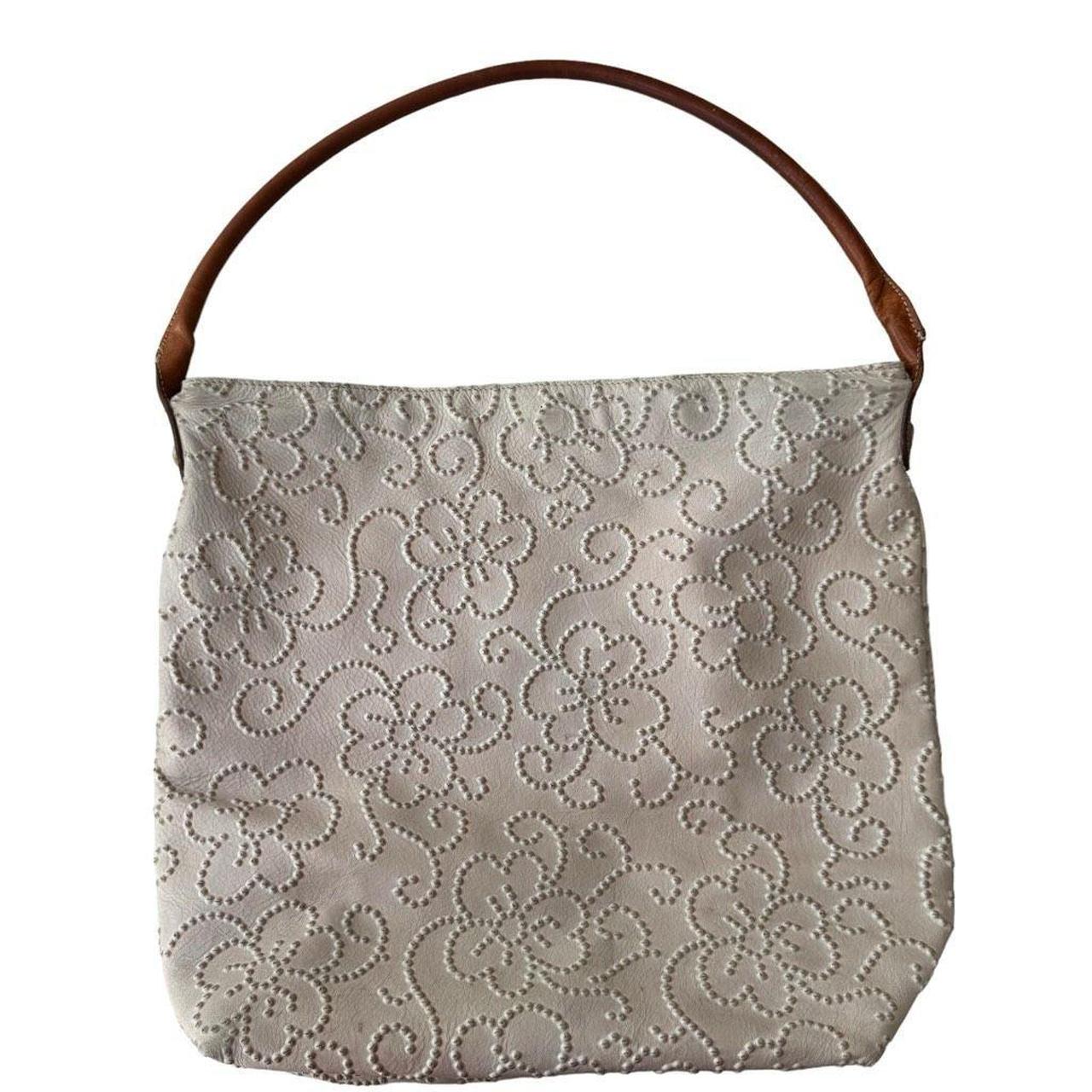 Maurizio Tauiti purse top