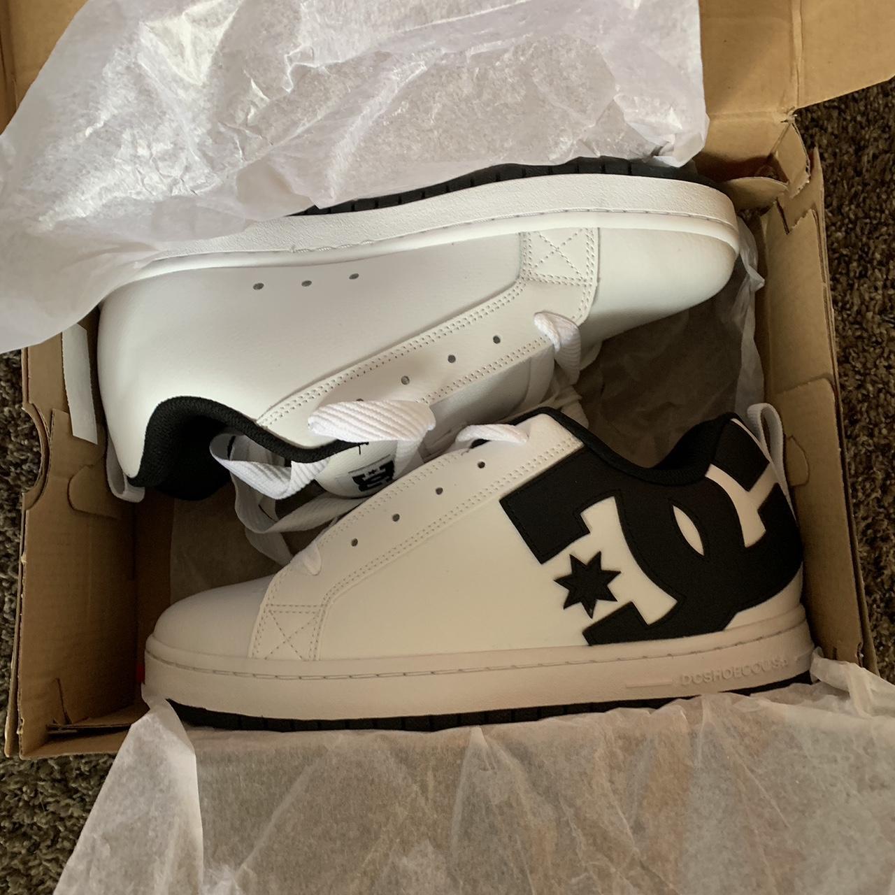 white and black dc shoes