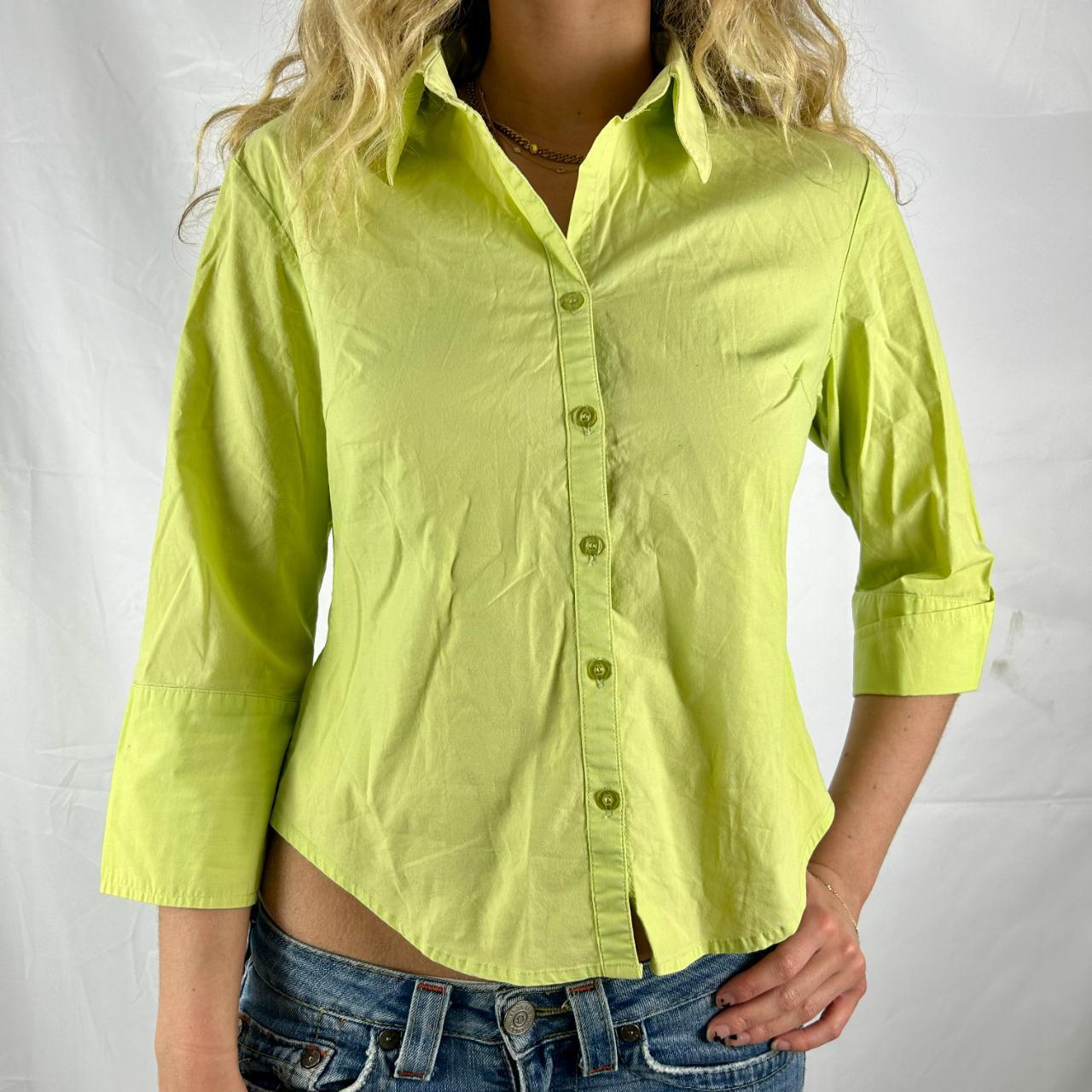 pastel green button up shirt, material is... Depop