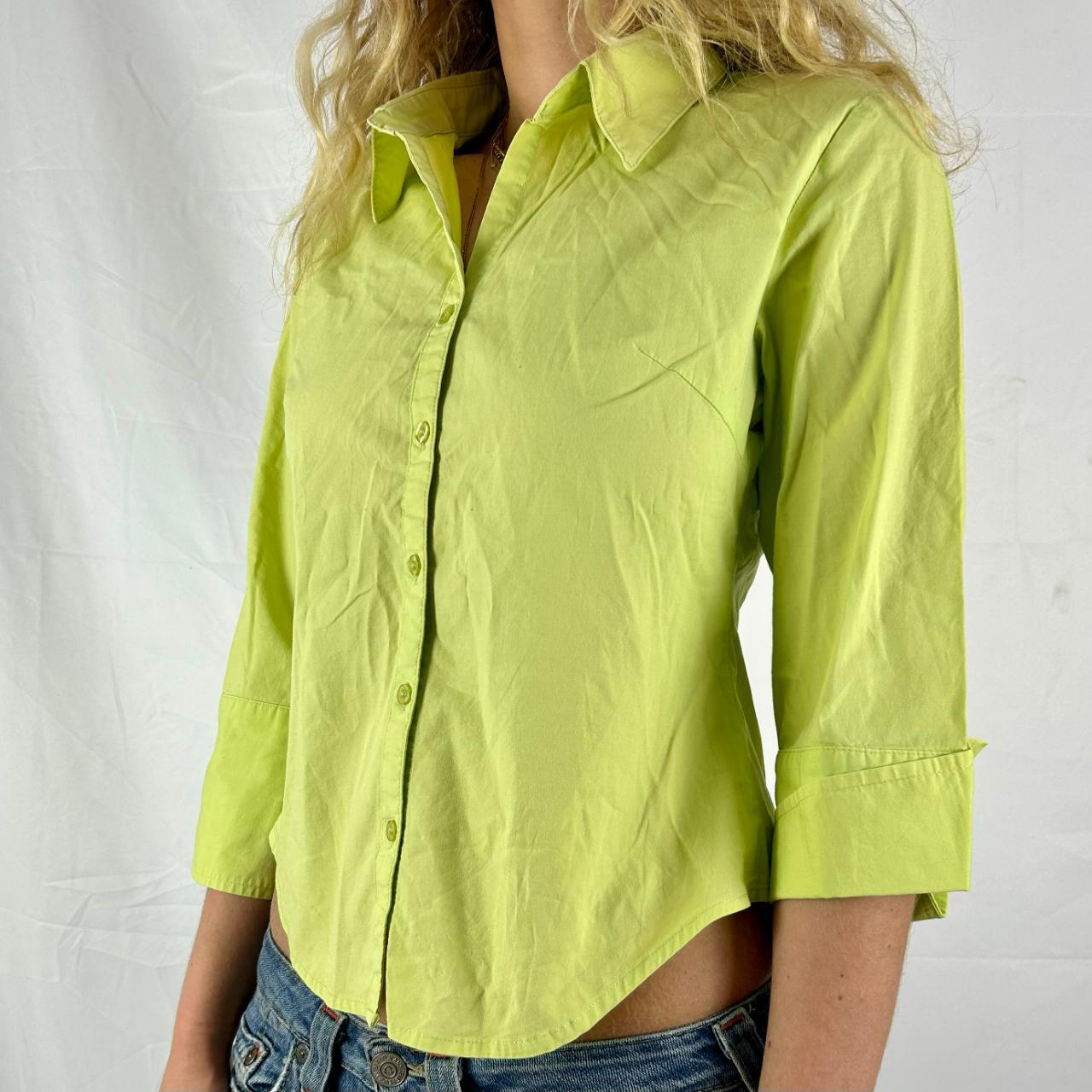 pastel green button up shirt, material is... Depop