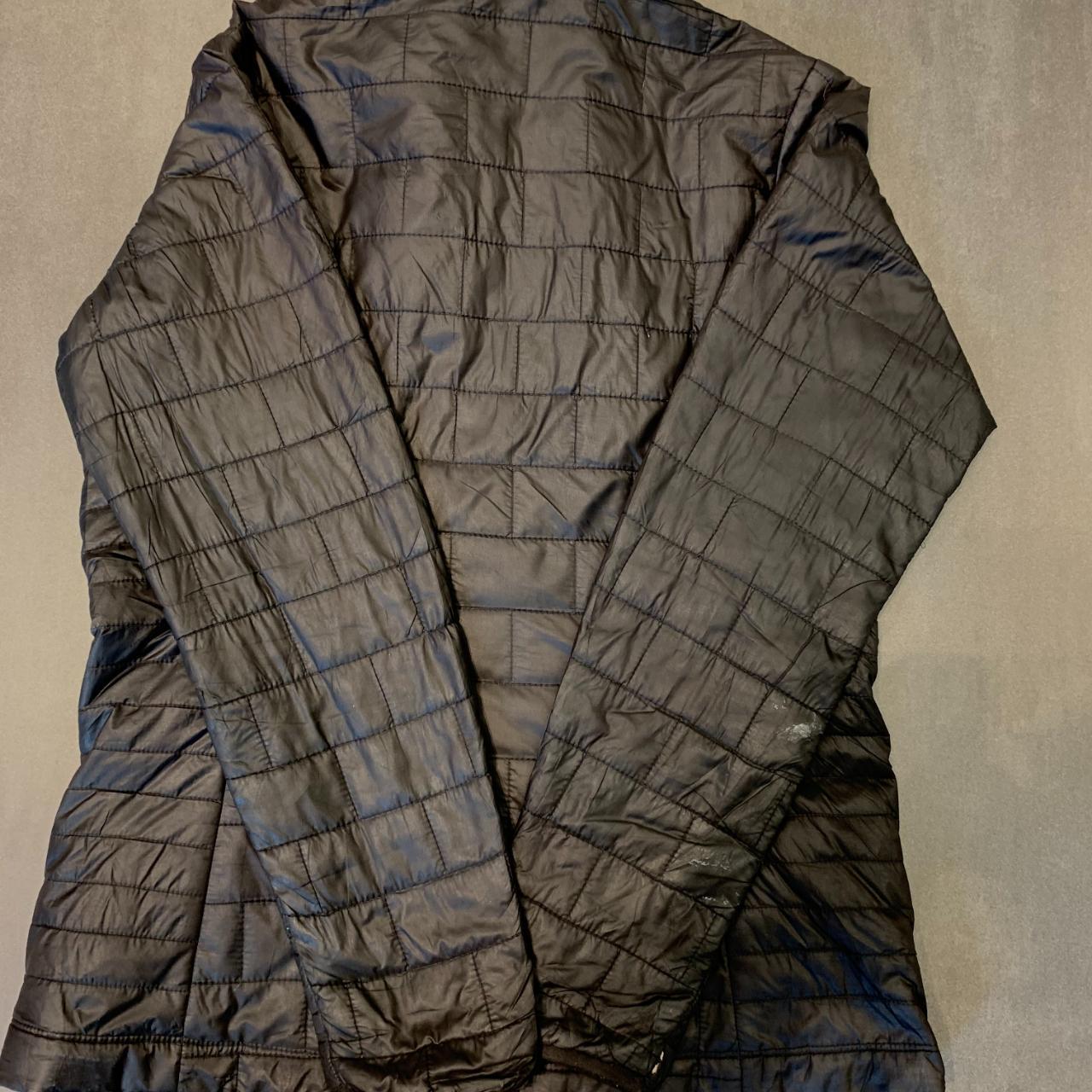 Patagonia black women's thin puffer jacket... Depop
