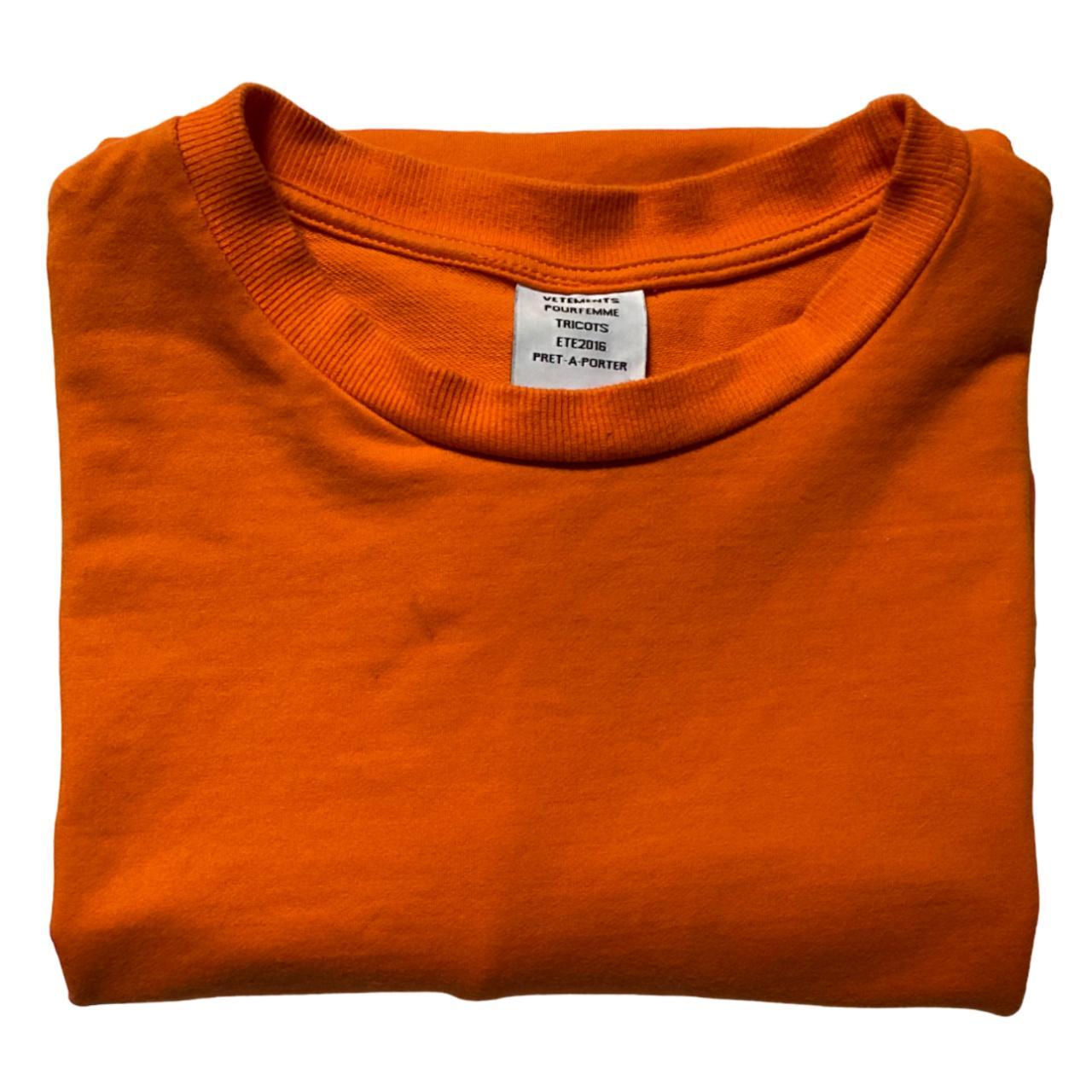Vetements Women's Orange and Black Shirt | Depop