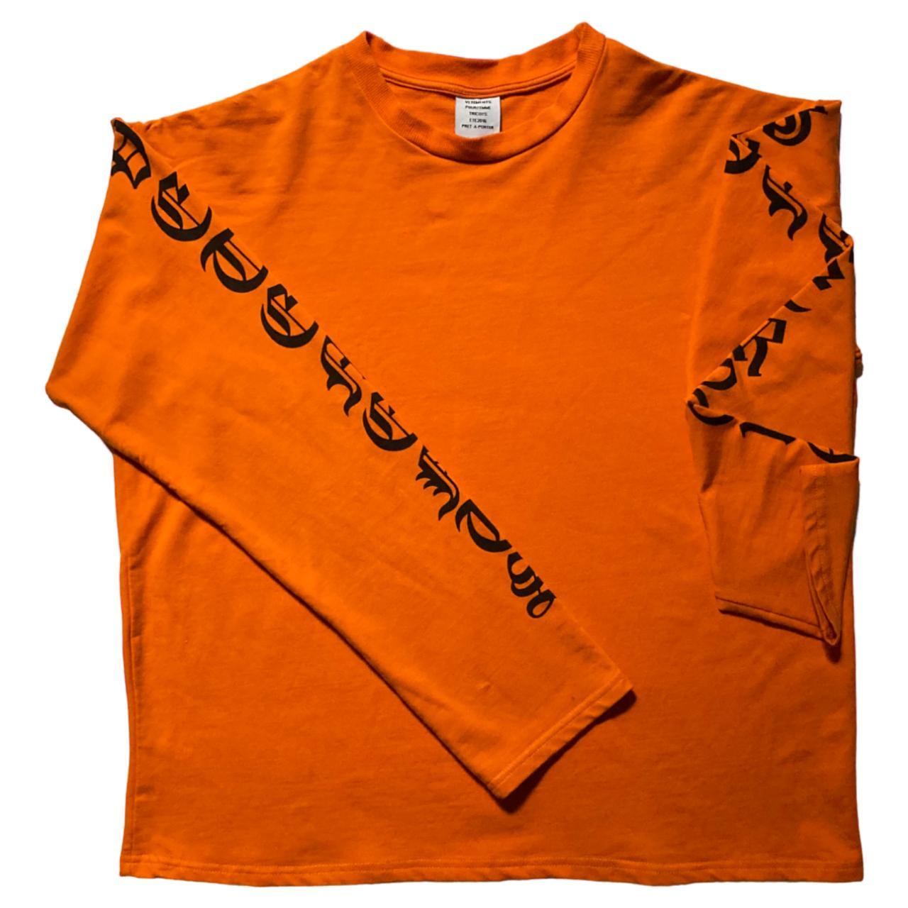 Vetements Women's Orange and Black Shirt | Depop