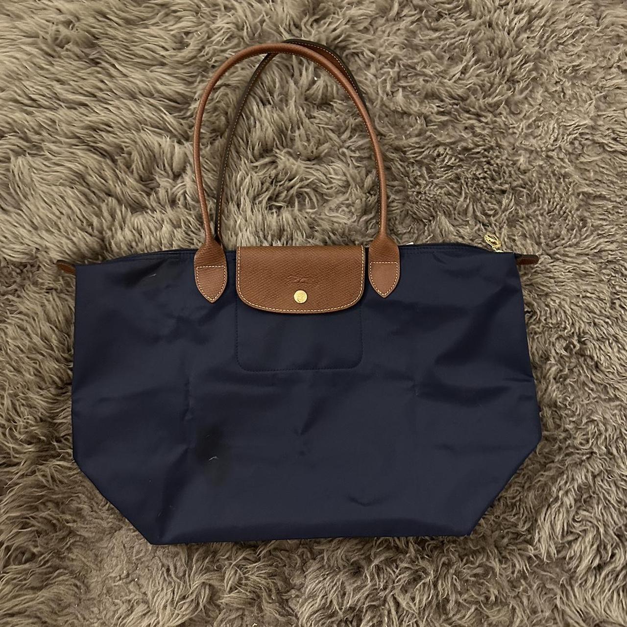 navy blue long champ bag - has a few noticeable... - Depop