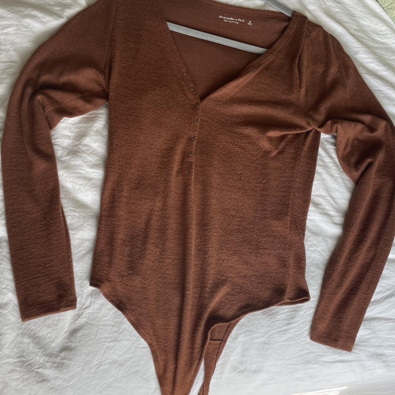 Soft orange long sleeve Abercrombie body suit... - Depop