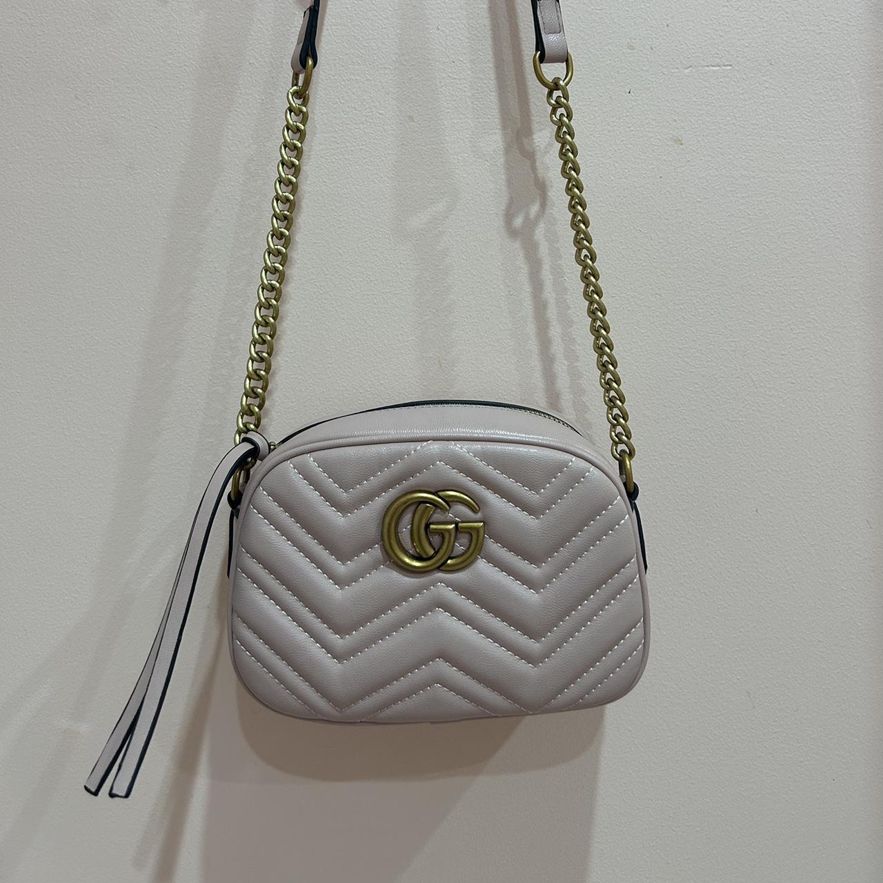 Thrifted light pink shoulder bag with gold detailing... - Depop