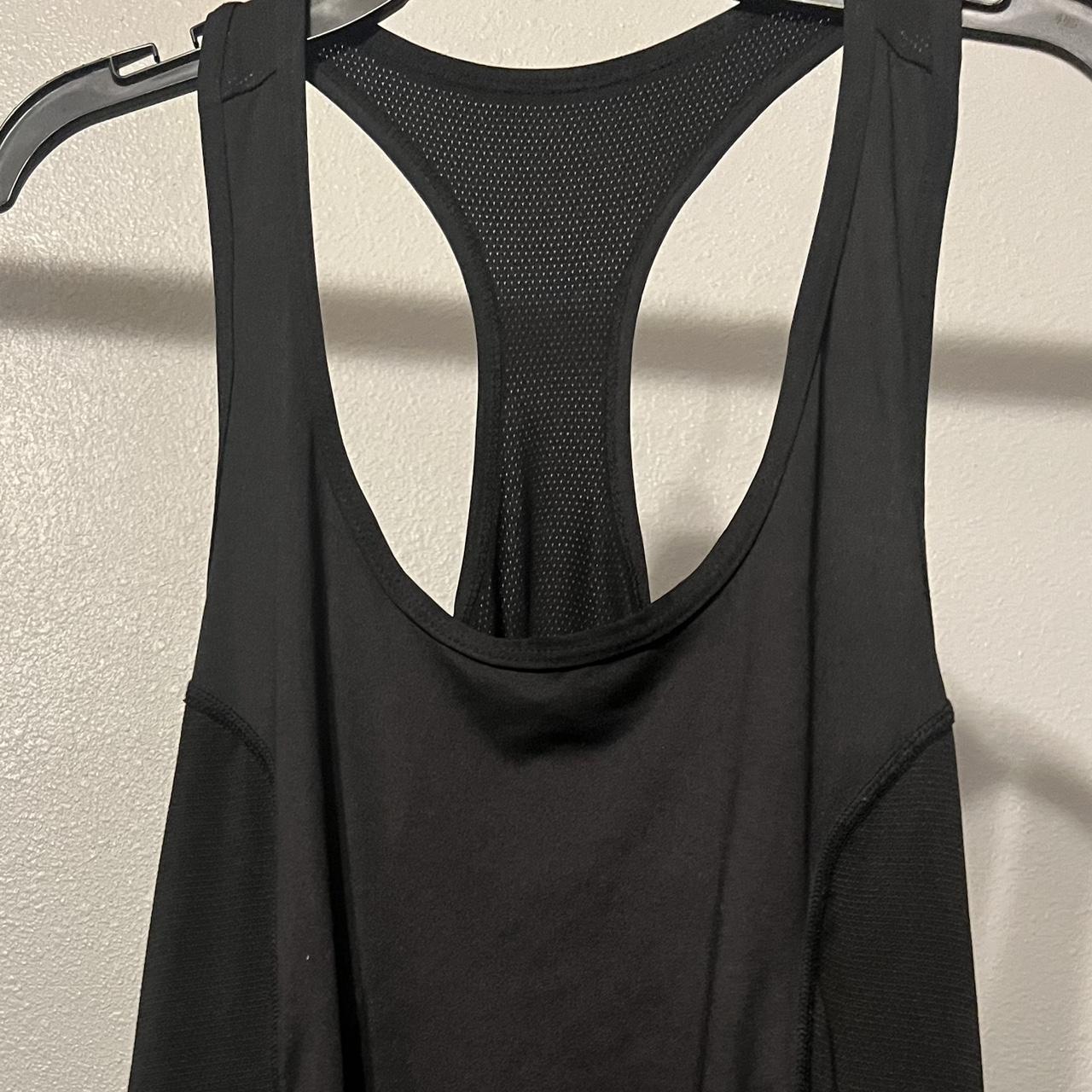 Xersion Women's Black Vest | Depop