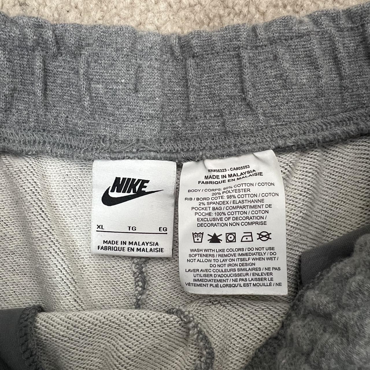 grey nike shorts junior
