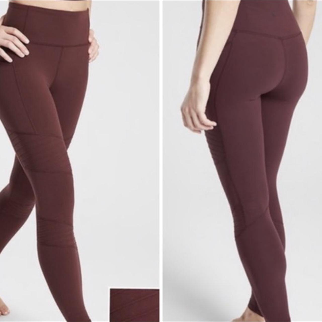 Purple burgundy Athleta leggings that have some ribs