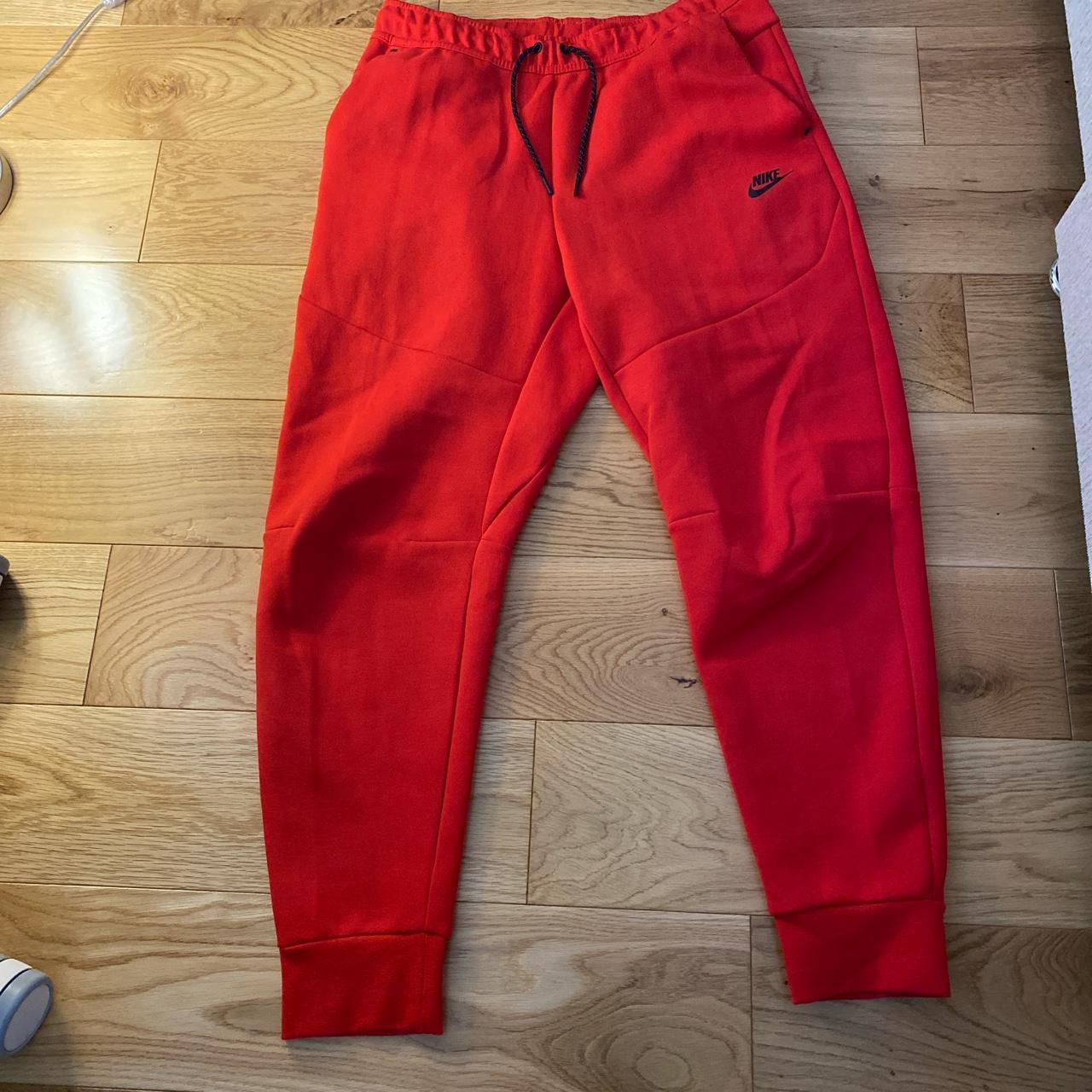 nike tech red joggers