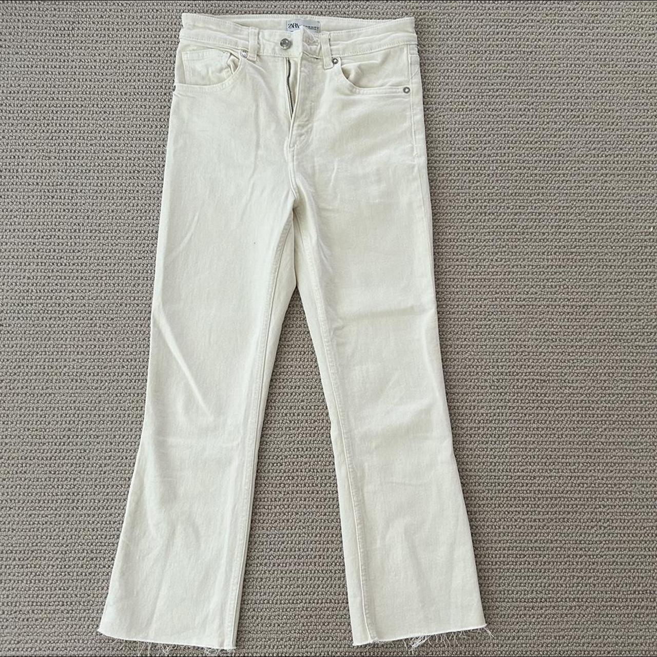 White jeans sale with frayed bottom