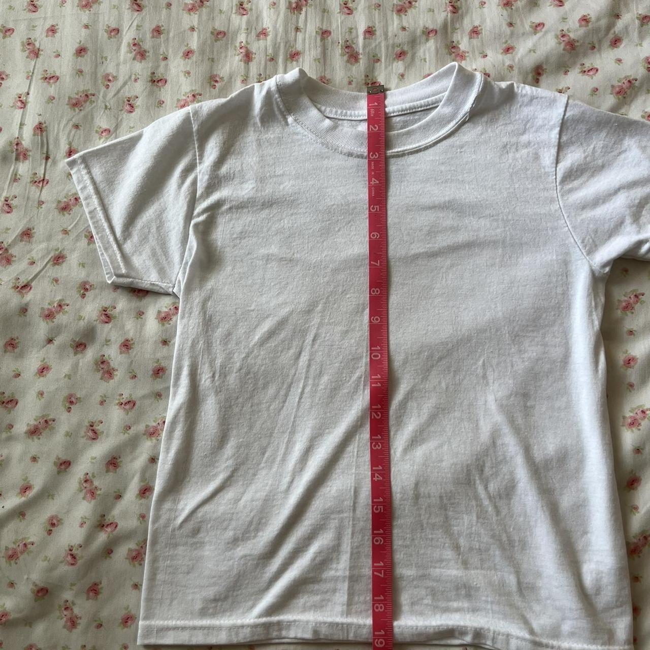 Plain white baby tee Round neck Perfect condition... Depop