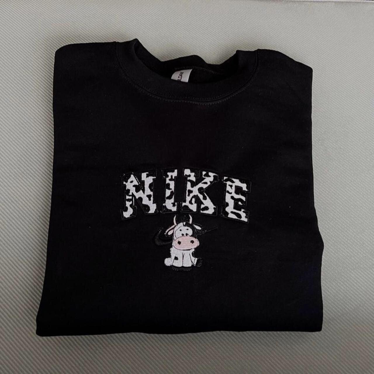 nike cow print logo