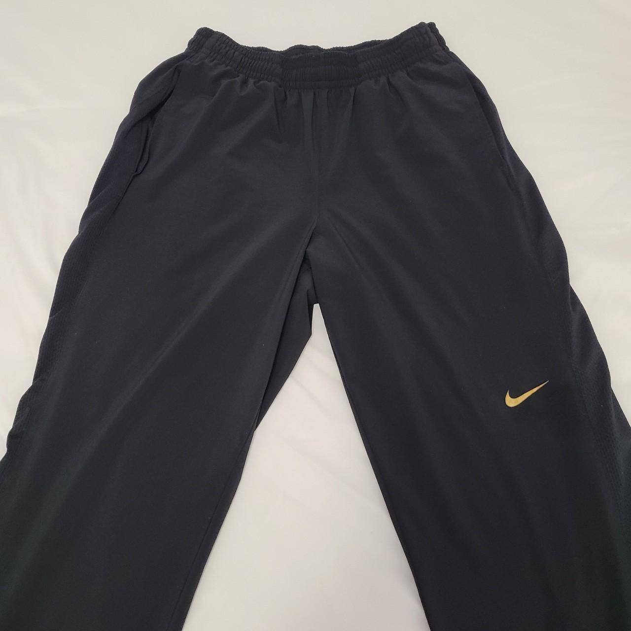 Black Nike trackpants baggy sweatpants. Drawstring - Depop