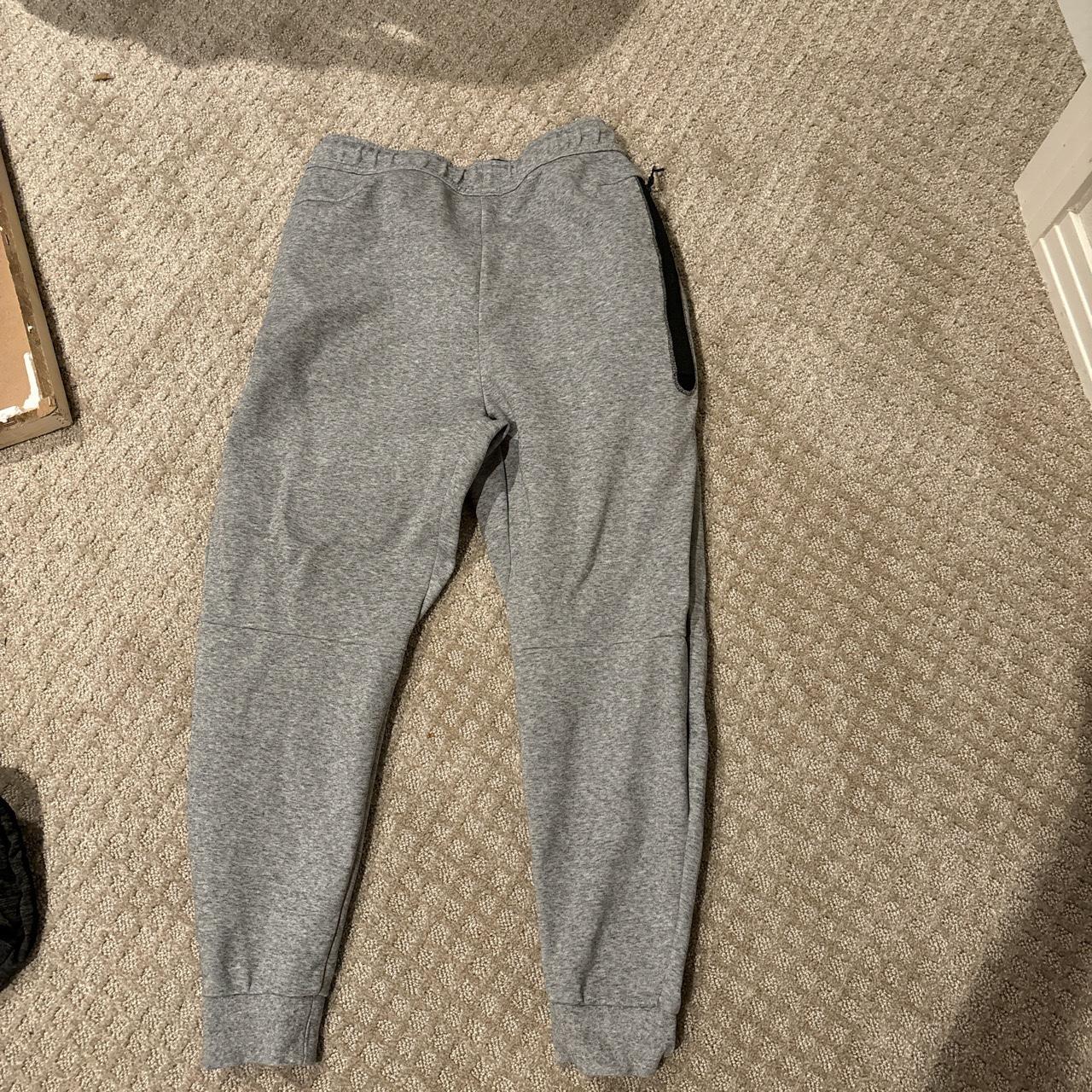 Gray Nike tech fleece pants size medium - Depop