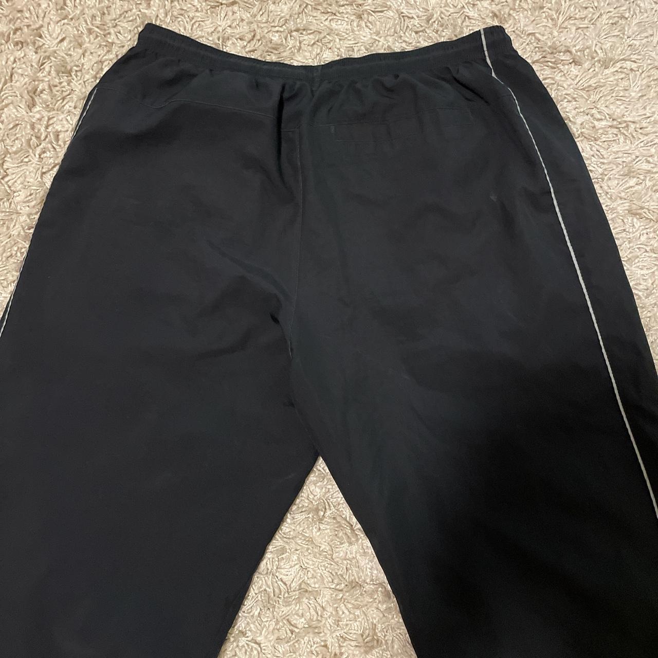 Black Nike track pants Size XXL (fits XL/L) Small... - Depop