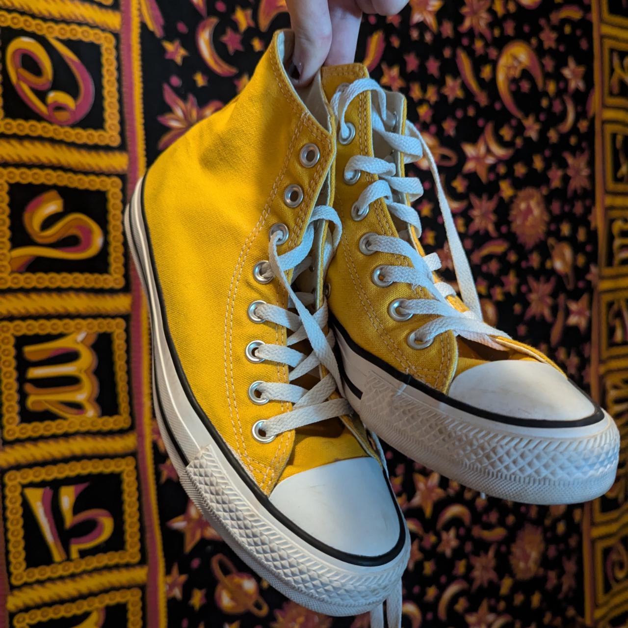 Like new yellow Converse high tops Has. Depop