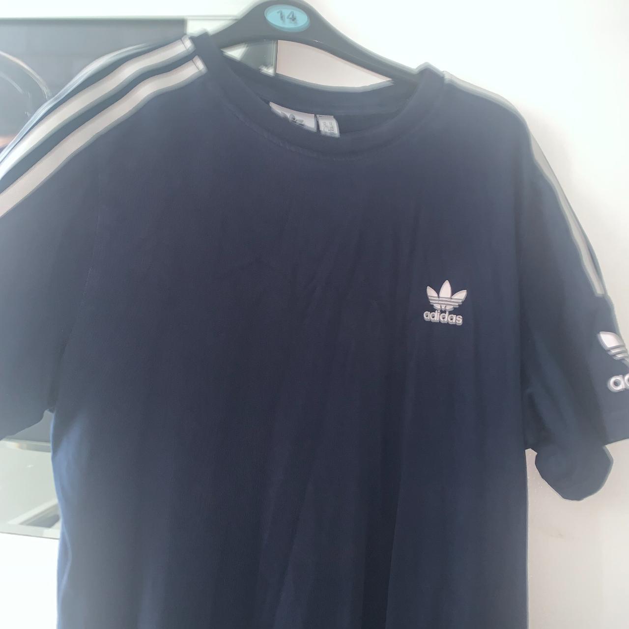 Navy Blue Adidas T-Shirt with White Stripes Been... - Depop