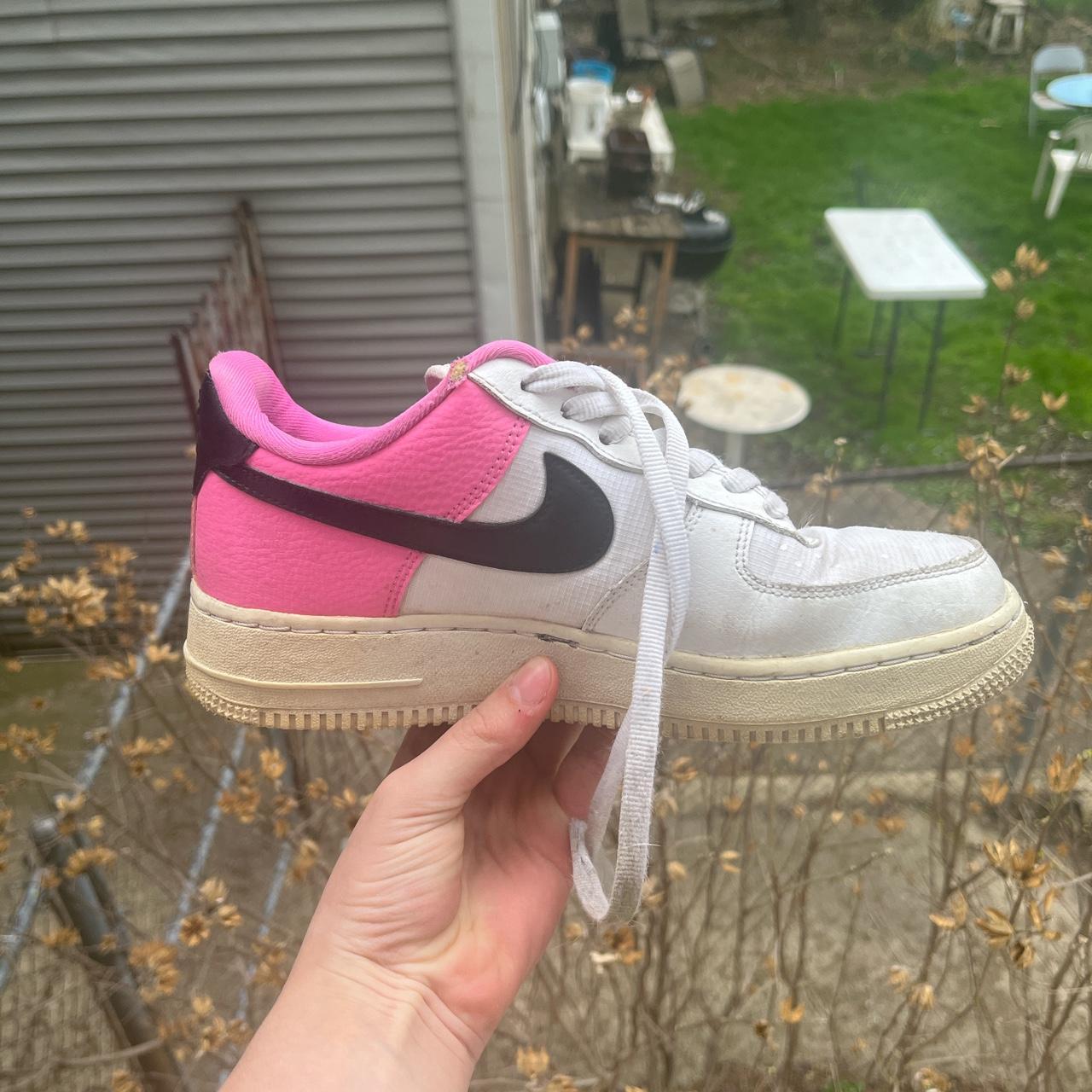 black air forces with pink swoosh