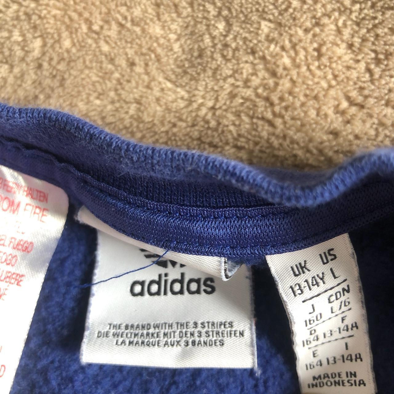 Navy blue and black adidas sweat shirt. - Depop