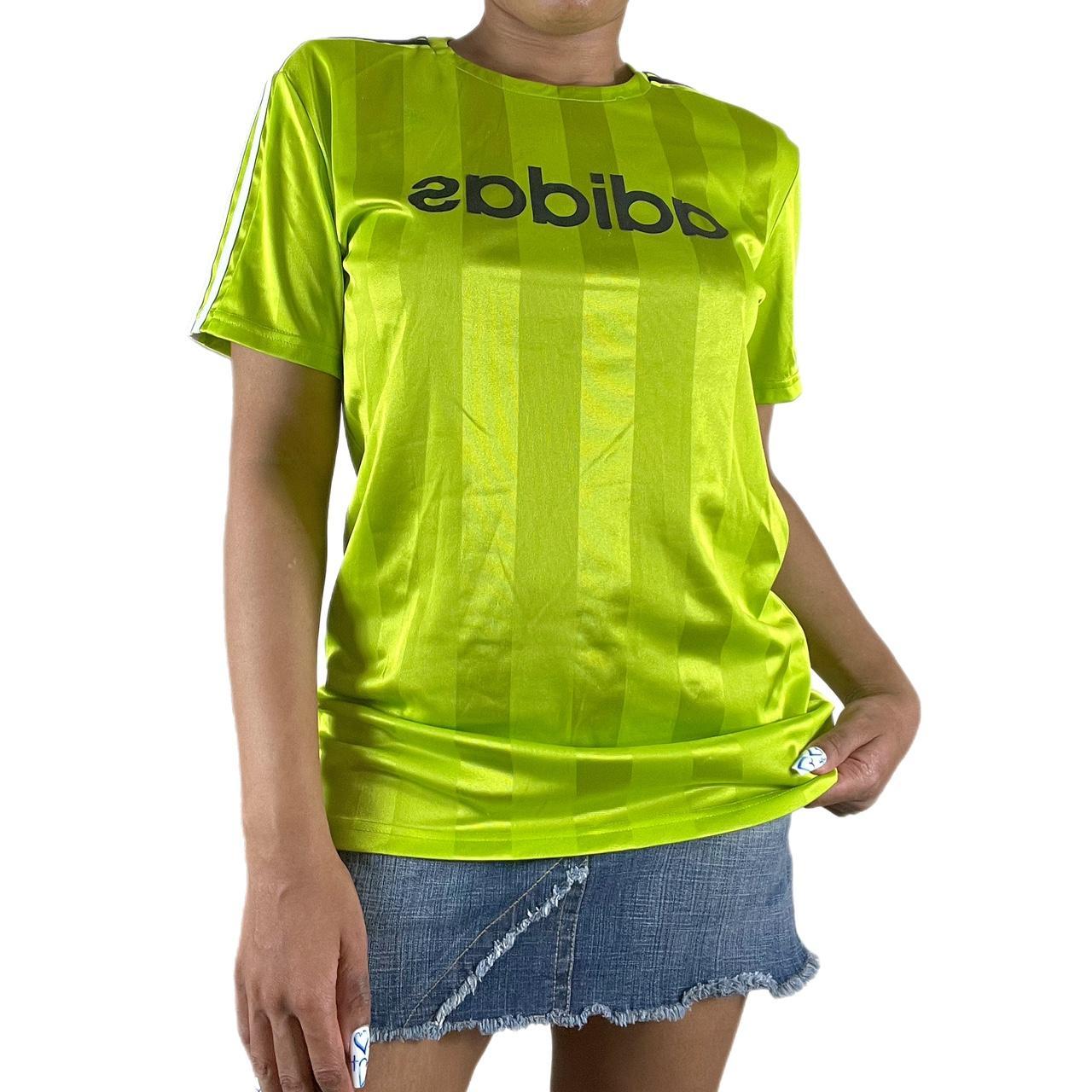 S317 Adidas lime green soccer jersey. Pair with a... Depop