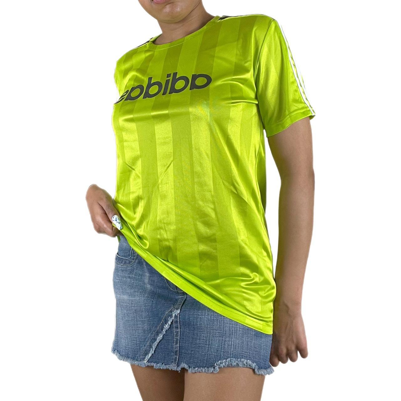 S317 Adidas lime green soccer jersey. Pair with a... Depop