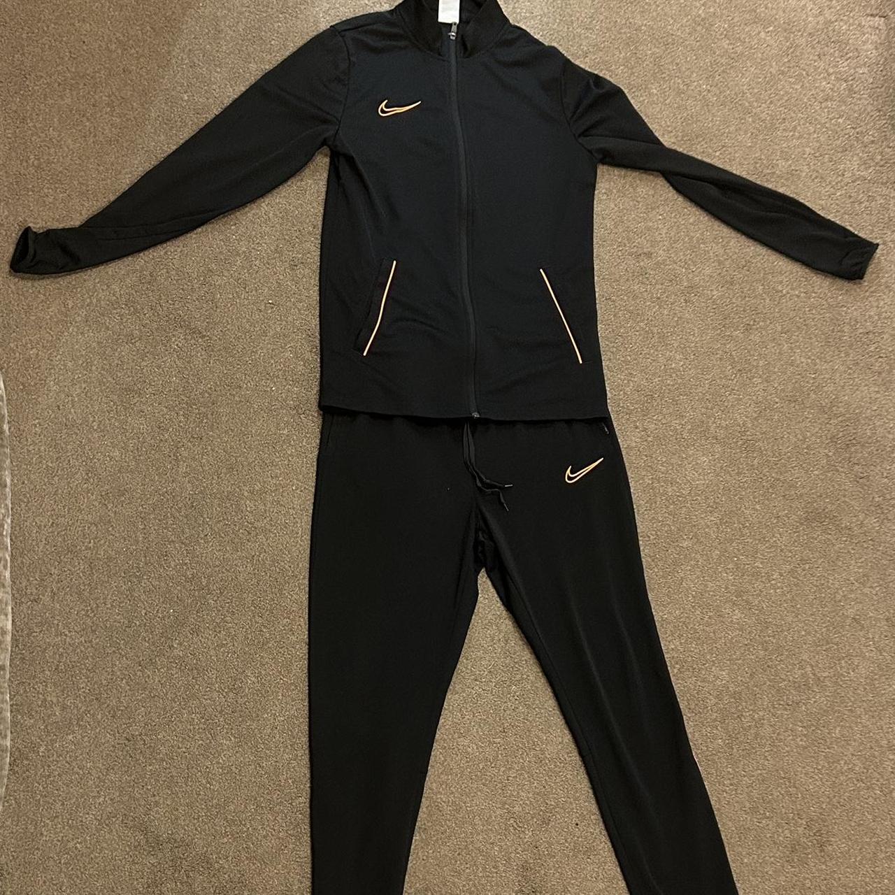 womens orange nike tracksuit