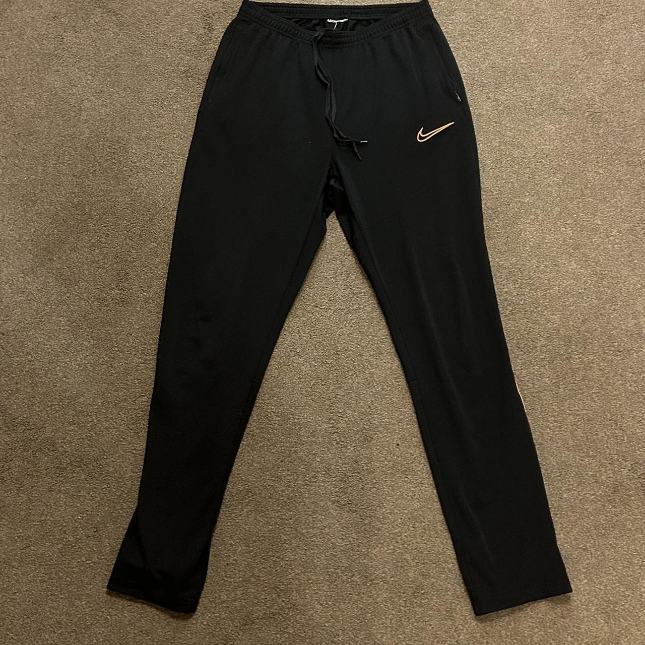 womens orange nike tracksuit