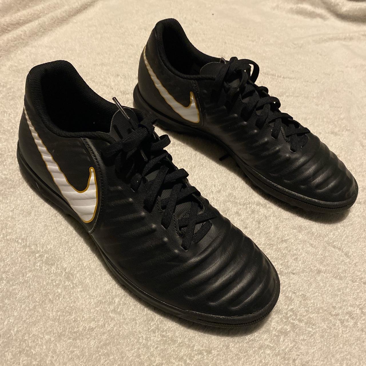 black and gold nike boots