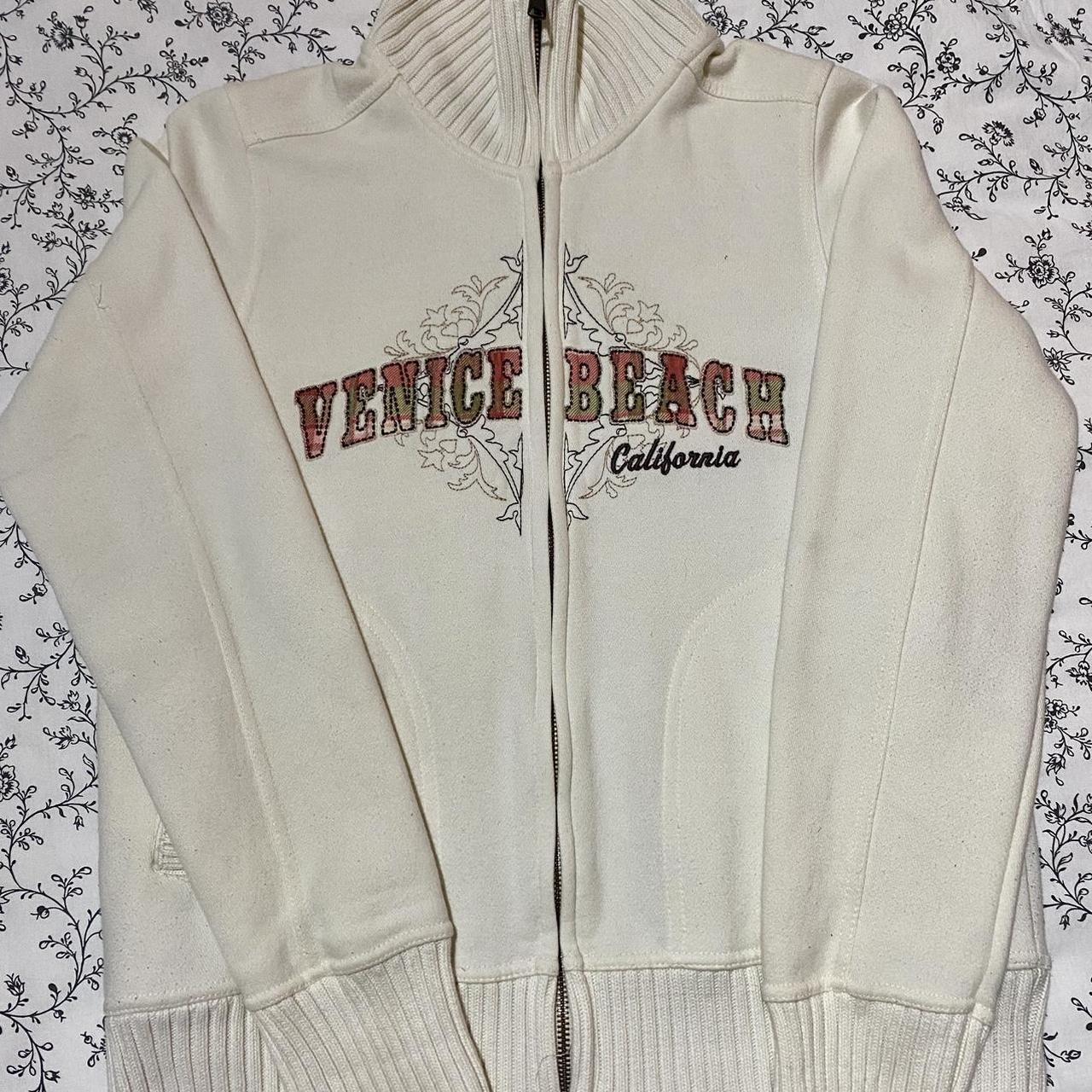 vintage venice beach zip up jumper with high neck in... Depop
