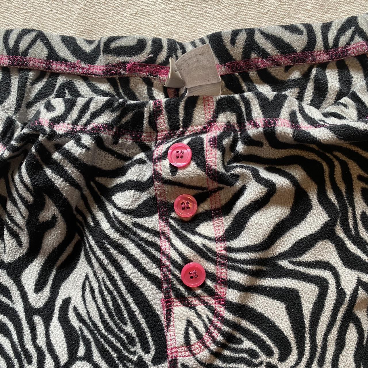 zebra print pj pants with pink detailing size... Depop