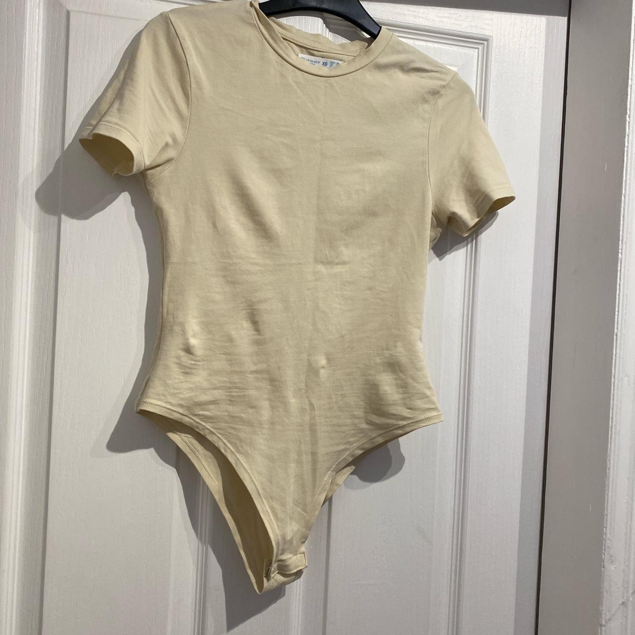 primark beige body suit slightly see through, worn... - Depop