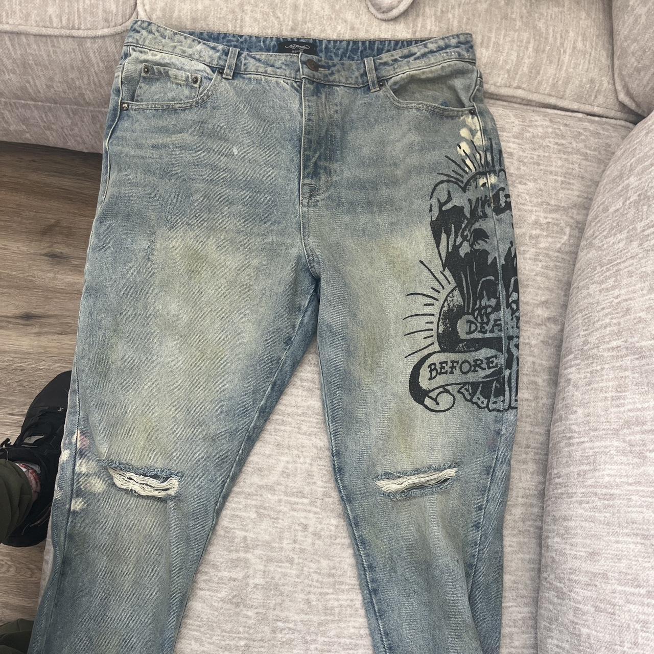 This Slim fit tapered jean by Ed Hardy features rip... - Depop