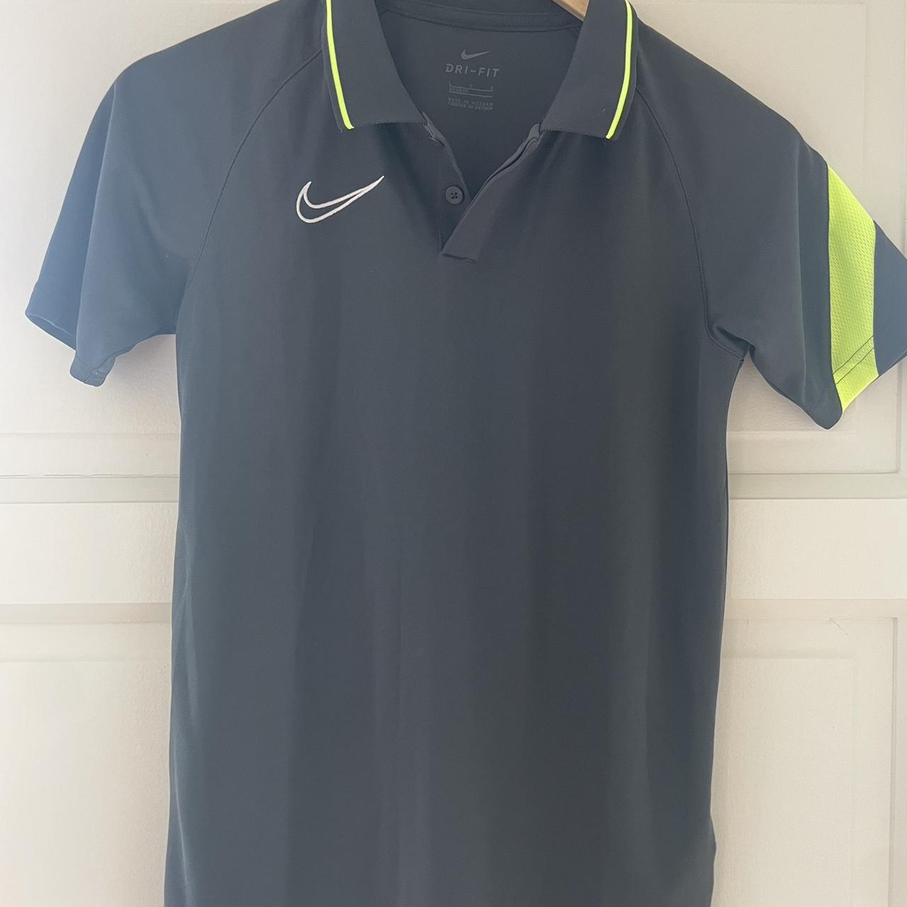 Kids Nike dark grey and neon green Dri Fit golf polo. Depop