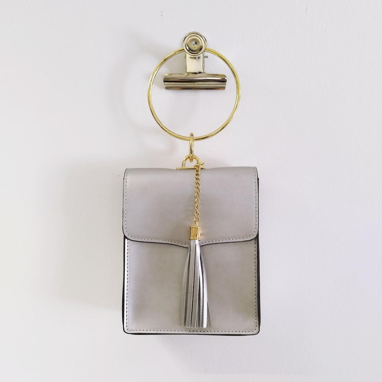 Piumelli silver leather crossbody bag with gold... - Depop