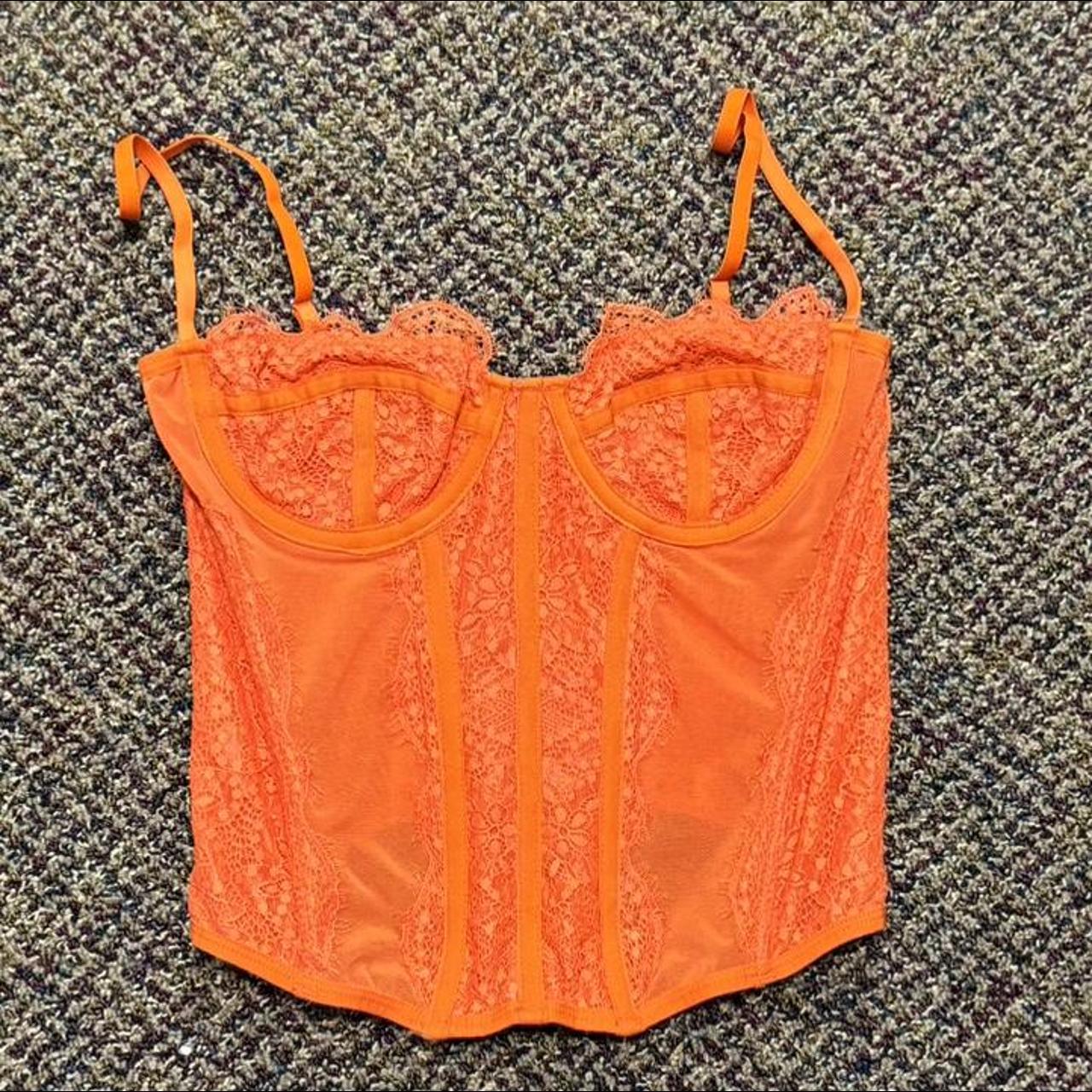 Orange corset top Bought here for my friend but she... Depop