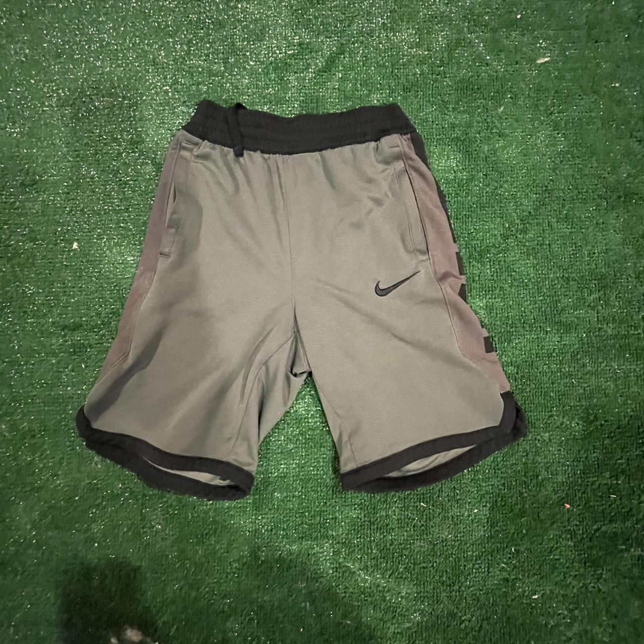 Grey and black nike elite shorts Small stain on back... Depop