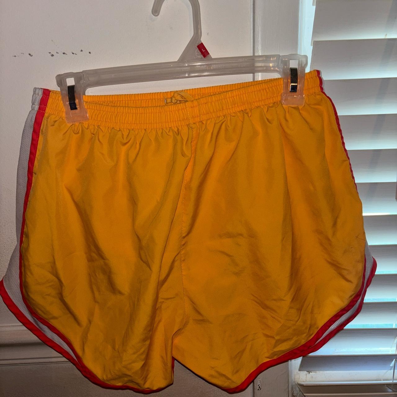 turf orange nike shorts