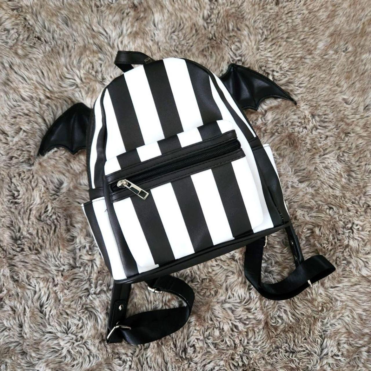 Black and white striped shops backpack purse