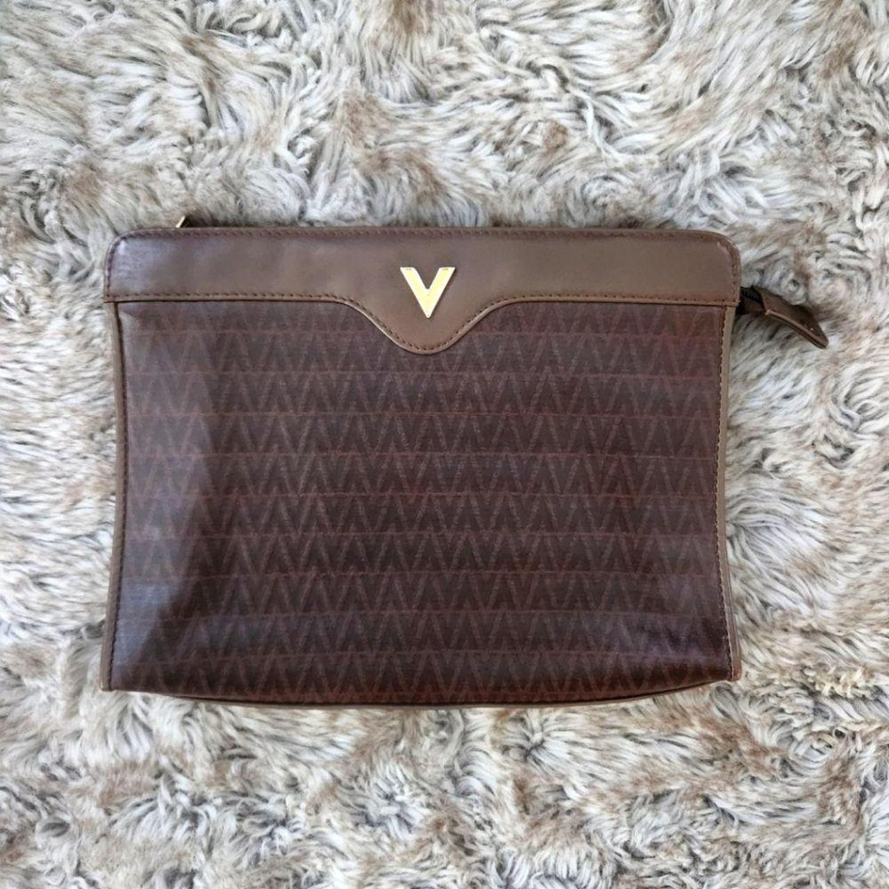 Mario popular Valentino zippered clutch