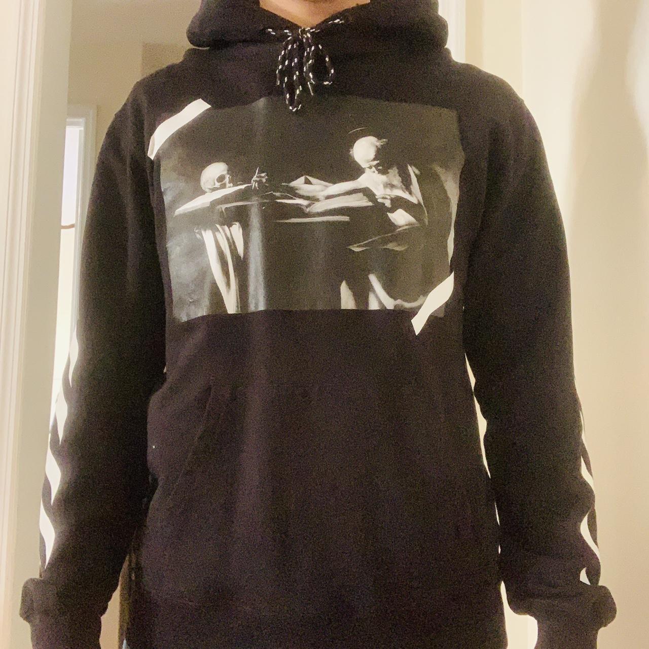 Off white jesus skull sale hoodie